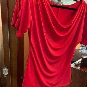 Sexy soft red shirt.. Medium but fits like Small! Polyester.